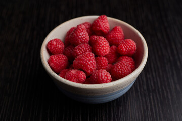 Close up of raspberry in the bowl