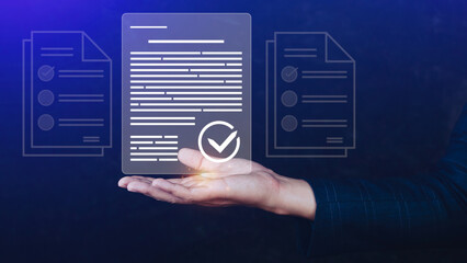 Paperless workplace idea, e-signing, electronic signature, document management system (DMS). Businessman signs an electronic document on a digital document on a virtual screen.
