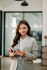 Modern business woman in the office with copy space.