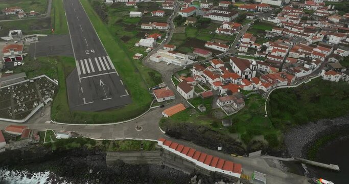 Aerial shots of the town of Corvo island and its aerodrome in the Azores