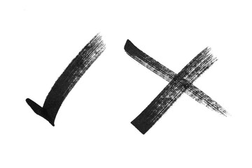 Check mark and wrong mark of handmade brush stroke isolated on white background.