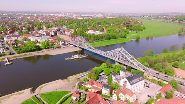 Paddle steamer drives on the elbe. Drone move to the left.