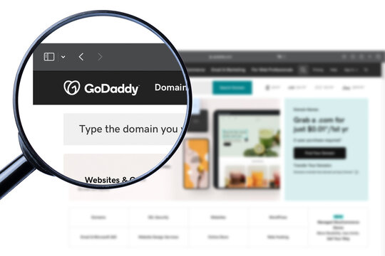 Milan, Italy - July 17, 2023: GoDaddy logo on the website homepage.