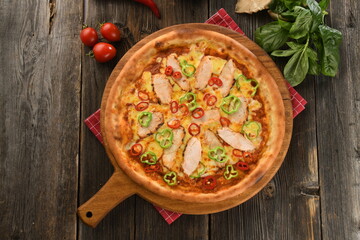 crusty delicious pizza with vegetable and chicken