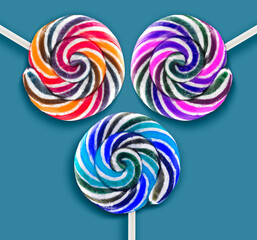 Fototapeta na wymiar colorful lollipops on blue background