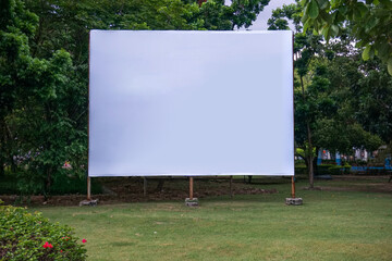 Blank billboard in front of nature landscape