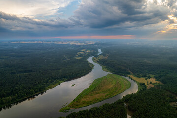 Fototapeta premium Aerial summer storm rainbow view of Merkine, Merkys and Nemunas rivers, Lithuania