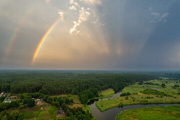 Aerial summer storm rainbow view of Merkine, Merkys and Nemunas rivers, Lithuania