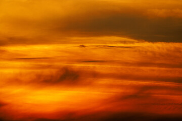 Fototapeta na wymiar Sunset clouds over the mountain