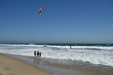 Kite surfing at Sunset Beach in California.
