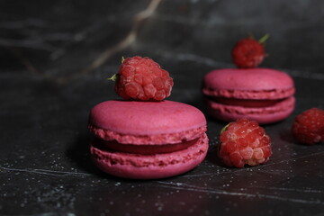 delicate delicious macarons cakes with raspberries