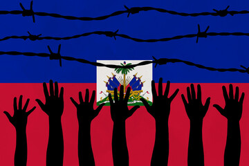 Haiti flag behind barbed wire fence. Group of people hands. Freedom and propaganda concept