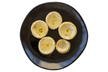 Artichokes with olive oil. Baby artichokes isolated on white background. Mediterranean cuisine. Top view