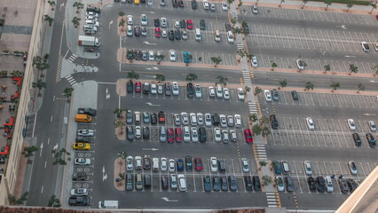 Aerial view of a parking lot with many cars in rows timelapse © HyperlapsePro