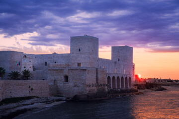 View of the Svevo Castle at sunset, Trani, Italy