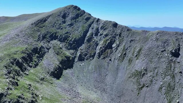 A mountain peak in Mercantour National Park seen from a drone