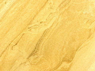 sand texture as a background. sand waves in the desert. golden sand for designers