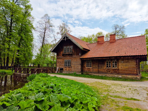 old house on the water with a watermill at the museum of agriculture in Ciechanowiec, Poland