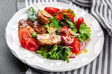 potato salad and vegetable baked potato, tomato, onion, salad leaves, salad dressing vinaigrette vegetables food healthy meal food snack on the table copy space food background rustic top view 