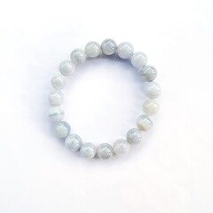 Aquamarine crystal bracelet on white background