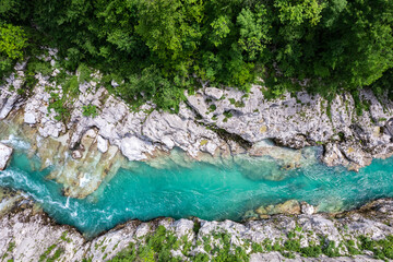 Emerald Soca river in Slovenia , aerial drone to down view