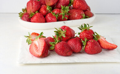 Ripe red strawberry on white background