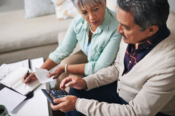 Finance, budget and senior couple on sofa planning, pension documents and retirement funding or...