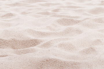 Beige pink Sand texture natural background. Close up waves pattern on sand dunes, light pastel color, minimal nature beautiful beach. Summer and travel, spa and relaxation concept. Selective focus. - Powered by Adobe