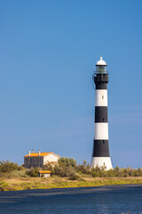 Fototapeta na wymiar lighthouse Faraman, Salin de Giraud, Provence-Alpes-Cote d'Azur, France
