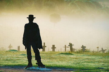 Sad Hill Cemetery with cowboy silhouette, Spain
