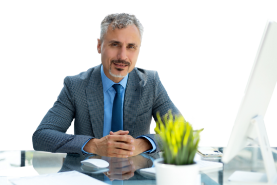 Mature businessman working on computer on a transparent background