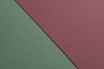 Fototapeta premium Rough kraft paper background, paper texture red burgundy green colors. Mockup with copy space for text.
