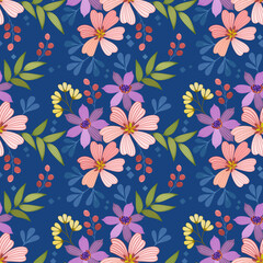 Colorful flowers design on blue color background seamless pattern for fabric textile wallpaper.