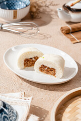Baozi or Bakpao is a type of yeast-leavened filled bun in various Chinese cuisines.