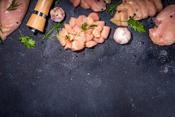 Chicken, turkey, white meat breast fillet on kitchen table, top view copy space. Different types of...