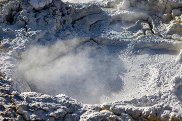 Stunning geothermic field of Sol de Mañana with its steaming geysers and hot pools with bubbling mud - just one sight on the lagoon route in Bolivia, South America