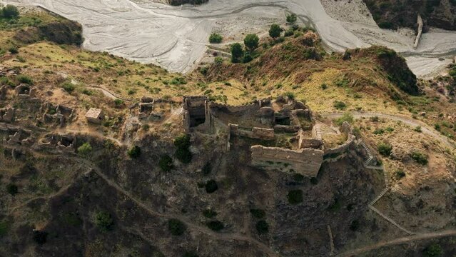 Ancient ruins of a medieval castle on top of the mountain. Amendolea Castle. 