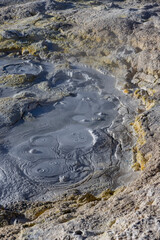 Stunning geothermic field of Sol de Mañana with its steaming geysers and hot pools with bubbling mud - just one sight on the lagoon route in Bolivia, South America