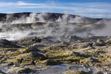 Stunning geothermic field of Sol de Mañana with its steaming geysers and hot pools with bubbling mud - just one sight on the lagoon route in Bolivia, South America