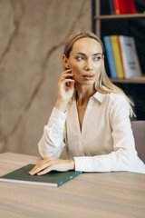 Woman sitting at the desk st the office