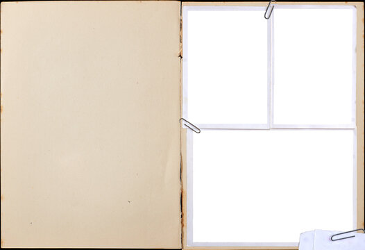 A vintage book page with three blank photo frames attached with paper clips.