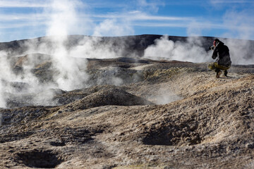 Stunning geothermic field of Sol de Mañana with its steaming geysers and hot pools with bubbling mud - just one sight on the lagoon route in Bolivia, South America