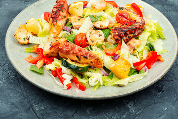 Octopus salad with raw vegetables.