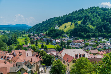 Fototapeta na wymiar A view south above the old town of Skofja Loka, Slovenia in summertime 
