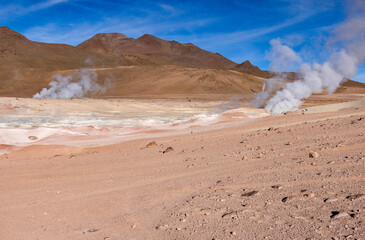 Stunning geothermic field of Sol de Ma&ntilde;ana with its steaming geysers and hot pools with bubbling mud - just one sight on the lagoon route in Bolivia, South America