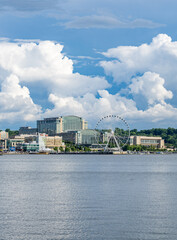 Dramatic summer clouds above panoramic skyline of National Harbor near Washington DC