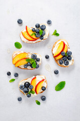 Homemade Toast with Blueberry, Peach and Cream Cheese, Delicious Summer Snack or Breakfast
