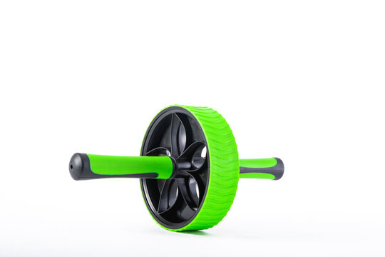 Abdominal wheel closeup image isolated on white background. Home fitness brake.