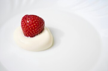 Strawberries. Healthy fresh summer fruit. Background with food. Yoghurt with fresh fruit