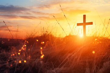silhouette christian cross on grass in sunrise - obrazy, fototapety, plakaty